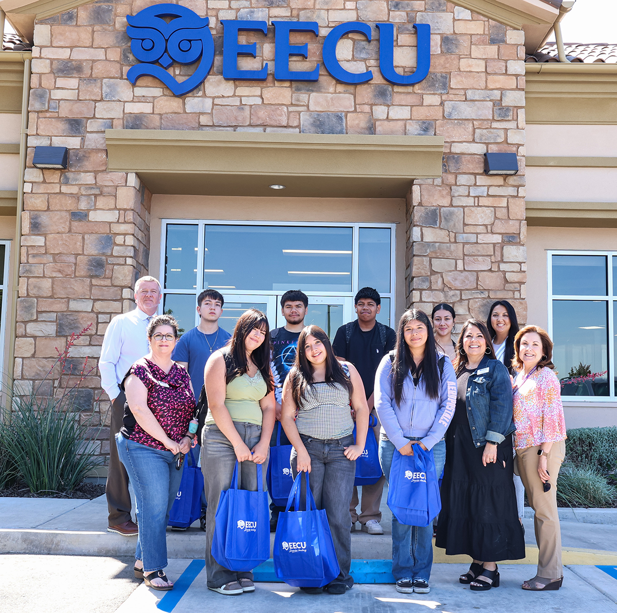 group of students in front of EECU branch